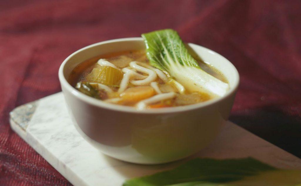 Traditional Nepalese thukpa noodle soup served in a bowl